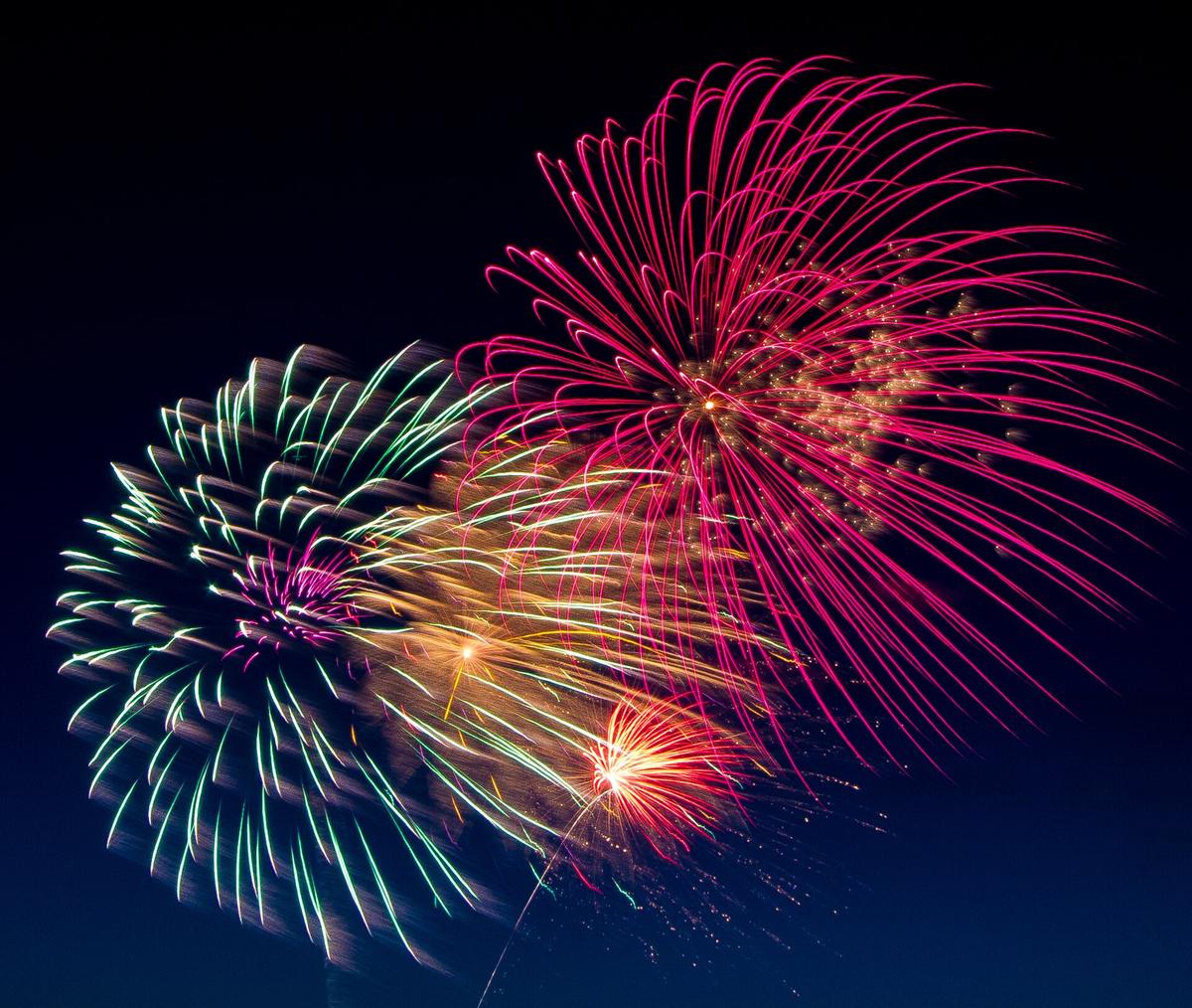 Fireworks bursting in the night sky